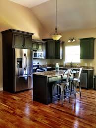 Industrial Rustic Kitchen Granite Dark Kitchen Cabinets Restoration Hardware Wood Floor Dark Kitchen Cabinets Kitchen Remodel Small Rustic Kitchen