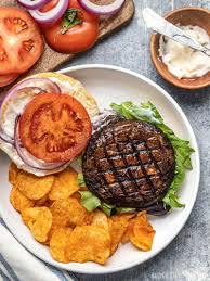 The burger, mushrooms, and onions are all placed on the grill at the same time. Marinated Portobello Mushroom Burgers Budget Bytes
