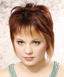 While the straight short bob adds length to her face, her edgy side bangs add angles that counteract its roundness. Pin On Haircuts