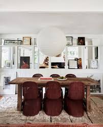 Layered rugs beneath the table help delineate the dining area, while pastel walls make the room feel more expansive and inviting. 65 Best Dining Room Decorating Ideas Furniture Designs And Pictures