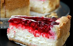 Den mürbeteig hineindrücken und an den rändern hochziehen (siehe. Pudding Schmand Kuchen Mit Himbeeren Welt Rezept