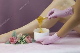 Worry about pustules caused by shaving with a razor blade; Hair Removal In A Luxury Spa Studio Women S Feet Wax With Saccharin Hot Sugar The Product Of The Wax Bowl Salon Bank Purple Lilac Background 440149868 Larastock