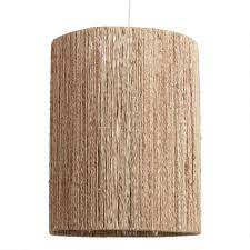 Most shades have a filtering insert inside of the shade for protecting the structural integrity of the woven material in addition to toning down the brightness of the bulb. Tall Woven Jute Drum Floor Lamp Shade World Market