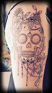 Bite That Tattoo On Your Shoulder Meaning In Hindi 50 Stunning Sugar Skull Tattoo Design Ideas Their Meanings Skull Thigh Tattoos Mexican Skull Tattoos Skull Tattoo