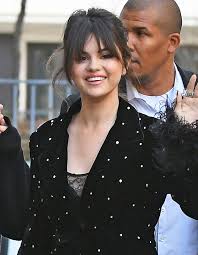 Once you are satisfied with the outcome, section out some hair at the front for the bangs. Selena Gomez S Hairstyles See Her Colors Haircuts Photos Hollywood Life