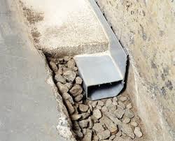 The slab is patched with fresh. French Drain Vs Waterguard Interior Drainage System