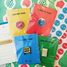 山田文具店さんはinstagramを利用しています 待望の図書グッズが 入荷しました 個人帯出カード ブックトラック 館内 禁帯出の4種類のピンバッチです 読書好きの方への プチギフトとしてもオススメです 店頭にて 先行販売中 山田文具店 yamadastati book