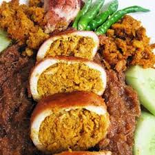 Masakan sotong/ cumi yang satu ini uniknya diisi ketan, rasanyan pulen dan gurih. Resepi Sotong Sumbat