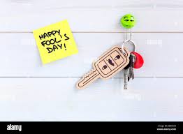 Key Ring Hung On The Wall With A Car Key Made Of Cardboard As A Joke For The Celebration Of Fool S Day Space For Text Stock Photo Alamy