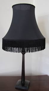 Vous venez d'ajouter à votre panier. Cet Abat Jour Pagode A Bandeau En Tissu Tendu Est Confectionne Dans Coton Noir Agremente De Franges De Meme Couleur Abat Jour Abat Jour En Tissu Abat