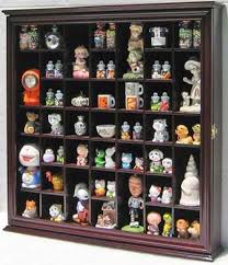It has a pentagonal shape and is adorned with some scalloped border in the top and some kind of wood spindles gallery in the. Small Wall Curio Cabinet With Abundant Variants