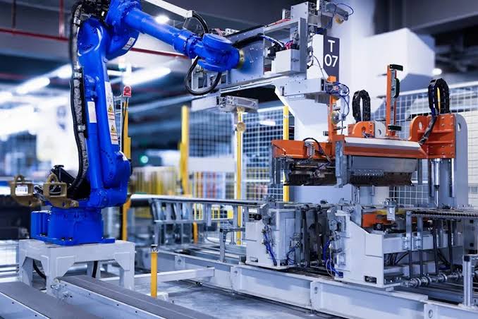 Automated robotic arm handling aluminium parts, AI generated