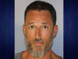 Buford man accused of throwing freezer at man