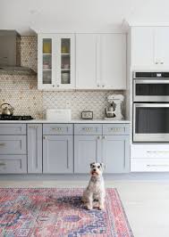Modern Gray And White Kitchen With Wallpaper And Two Toned Cabinets In 2020 Gray And White Kitchen Eclectic Kitchen Kitchen Cabinets