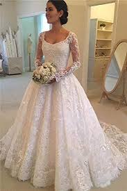 Many people ask if lace wedding dresses are in style, and the answer is yes. Buy A Line Lace Applique Long Sleeve Sweetheart Covered Button Wedding Dresses Js331 Online Jolilis