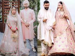 Indian idol judge neha kakkar is facing brutal trolling for allegedly stealing the wedding dress of anushka sharma, priyanka chopra and deepika padukone? Neha Kakkar Gets Brutally Trolled For Copying Bridal Looks From Anushka Sharma Priyanka Chopra Jonas And Deepika Padukone And We Have Questions