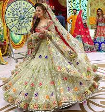 Kashee S Boutique Exclusive Mayo N Mehndi Dholki Lehnga Grab This Amazing Lehnga Pairing With Y Bridal Dresses Indian Designer Outfits Bridal Outfits