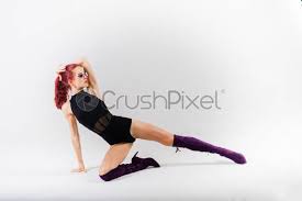 Looking for the best flexible tripod for taking pictures at different angles? Young Beautiful Flexible Female In Black Jumpsuit And High Heels Stock Photo Crushpixel