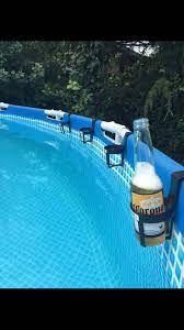 Summer Hack Use 0 99 Car Cup Holders Around The Edge Of An Above Ground Pool For Easy Drink Access Pool Hack Pool Dr Diy Swimming Pool Pool Life Pool Decks
