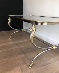 These unique coffee tables are designed after antique grape crates once used in the vineyards of europe. Large French Brushed Steel And Brass Coffee Table With Horse Heads Shoes In The Style Of Maison Jansen 1970s For Sale At Pamono