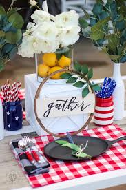 Another framed flag makes its appearance in this country style living room with its weathered wood ceiling and rustic walls. Beautiful Red White And Blue Table Decorations For July 4th
