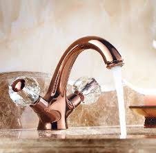 crystal handle rose gold faucet in gold