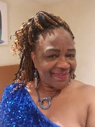 Wearing overalls with a Bluey head accessory