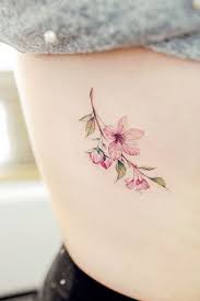 23 Flower Tattoos Designs And Meanings For Your Inspo Tattoos Tattoo Designs And Meanings Blossom Tattoo