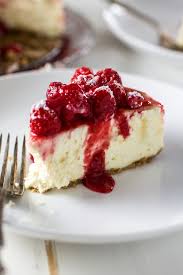 Savor all the rich flavor of cheesecake but with less fat and calories as in this lightened verson of raspberry swirl cheesecake. Classic Cheesecake With Raspberry Sauce Olivia S Cuisine