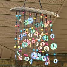 Diy Wind Chimes Colorful Metal Washer Wind Chime Easy Creative And Cool Windchimes Made From Wooden Be Wind Chimes Craft Diy Wind Chimes Diy Spring Crafts