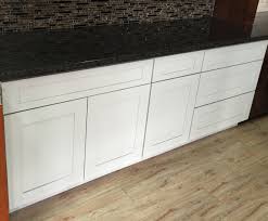 This creates a continuous look and minimizes the visible gaps between each cabinet door. White Maple Shaker Kitchen Cabinets