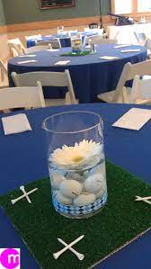 Spring centerpieces add just the right touch to a fun, warm weather meal. Golf Theme Centerpiece At Post Tournament Luncheon Golf Lorisgolfshoppe Golf Table Decorations Golf Centerpieces Golf Theme