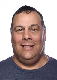 Rockford football coach Ralph Munger hospitalized