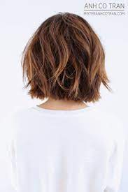A short updo might seem a little tricky but try out a low messy bun with a few loose hairs falling around your face. Pin On Have A Good Hair Day