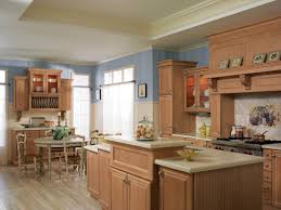 One Of Many Design Ideas For Your Kitchen From Merillat Cabinets Available At Zeeland Lumbe Kitchen Cabinet Remodel Red Kitchen Decor Cabinets And Countertops