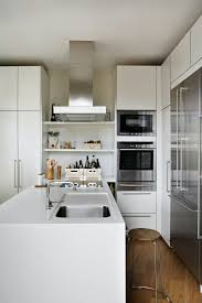 Un Ilot Perpendiculaire Entre Deux Colonnes C Est Design Designs De Petite Cuisine Cuisines Design Cuisine Moderne