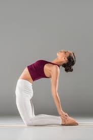 Slightly raise your head and contract your abdomen while bending your left knee, inclining your torso and bringing your right elbow toward the knee. 15 Yoga Asanas That Will Give You A Flat Tummy