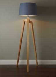 Floor lamp, rattan wrapped stem and brushed brass. How Tripod Floor Lamps Are The Best For Your Living Room Wood Floor Lamp Diy Floor Lamp Wooden Tripod Floor Lamp