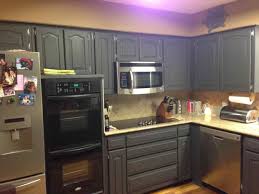 painted kitchen cabinets with black