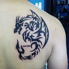 Amazing tribal dragon tattoo idea. 60 Tribal Dragon Tattoo Designs For Men Mythological Ink Ideas
