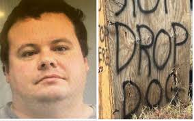 Sign: Man Charged After Nailing Dog To Plywood Sign