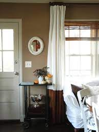 Draperies as a frame in this nursery, drapery panels are hung high to maximize the effect of the peaked ceiling. Ideas For Beautiful And Affordable Window Treatments Diy