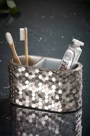 But proper bathroom accessories would save you from this nightmare as your soap and towels. Homeware Bathroom Bathroom Accessories Gold Toothbrush Tidy Toothbrushtidy Bathroomaccessories Next Bahrain