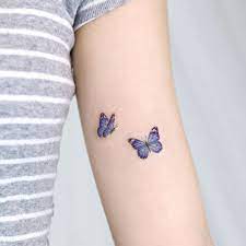 Palette On Instagram You Have Two Sky Purple Butterflies In Your A Palette On Instagram Yo Butterfly Tattoos For Women Purple Tattoos Pattern Tattoo