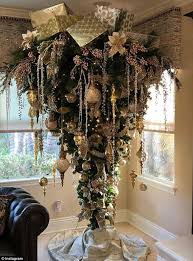 The chandelier is made of metal with dark bronze finish. People Are Hanging Their Christmas Trees Upside Down Daily Mail Online