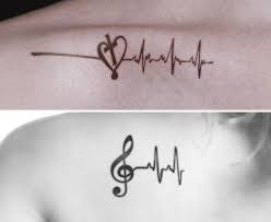 Heartbeat Tattoos With Music Notes And Cross Heartbeat Tattoo Heartbeat Tattoo Design Line Tattoos