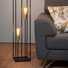It could be to provide a simpler form of a reading table or to enjoy drinks on your balcony. Ruben Floor Lamp Black Three Bulb Lights Co Uk
