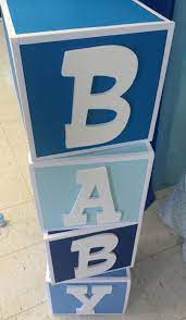 Baby Blocks 12x12 Boxes Cover With Cardstock And Trimmed With White Card Stock Letters Purchased From Hobb Baby Blocks Baby Shower Baby Shower Diy Baby Blocks