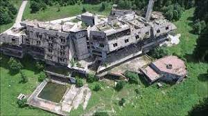 The abandoned shell of a hotel constructed for the 1984 winter olympics and where competitors stayed. War Abandoned Olympic Village Sarajevo Youtube