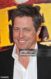 95 Hugh Grant March 21 2012 Stock Photos, High-Res Pictures, and Images